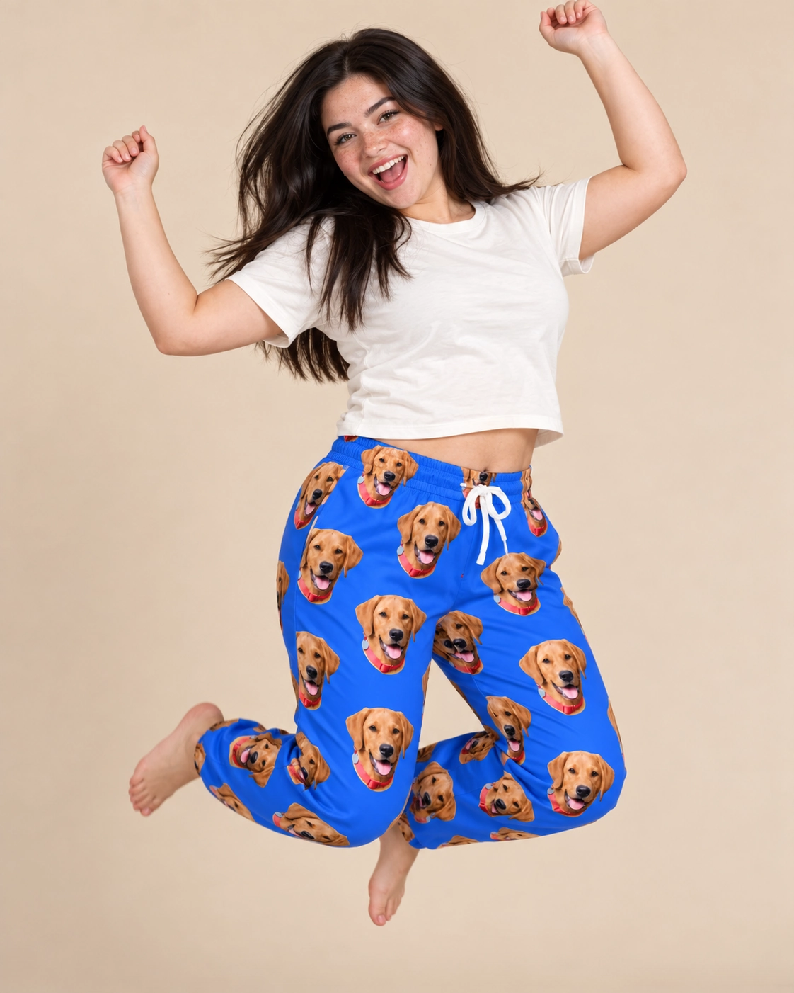 Plaid Pajama Pants – Pose, Royal Blue | MyDogPics Woman posing in plaid pajama pants, golden retriever faces on royal blue fabric — MyDogPics