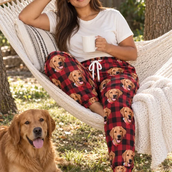 Woman in plaid pajama pants with her golden retriever — MyDogPics