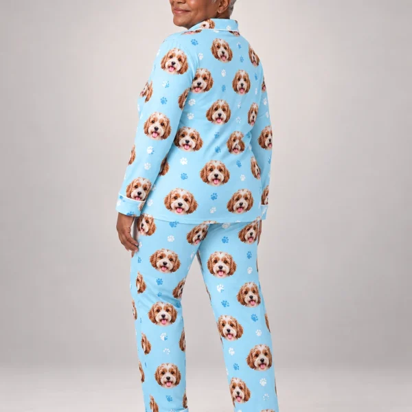 Woman posing in plaid pajamas, doodle puppy faces on light blue paw-print fabric with contrast piping — MyDogPics