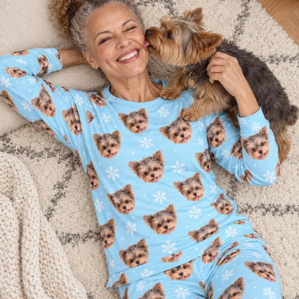 Woman in a plus size pajama sets cuddling her Yorkshire terrier — MyDogPics