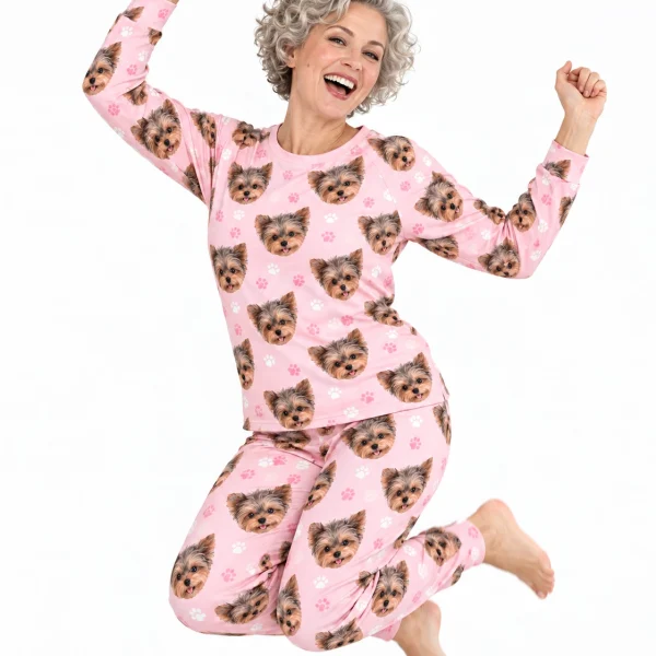 Woman posing in a plus size pajama sets, Yorkshire terrier faces on blush pink paw-print fabric — MyDogPics