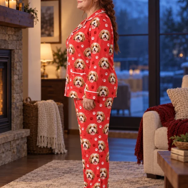Side view of plus size pajamas with doodle puppy faces on red paw-print fabric with contrast piping — MyDogPics