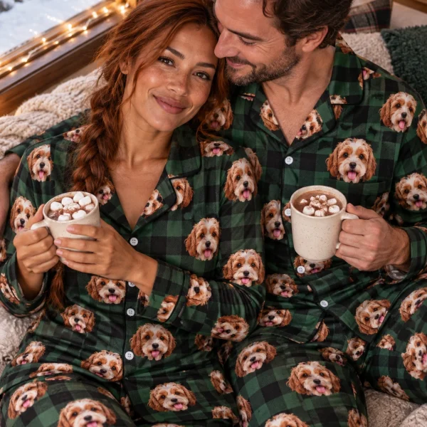 Woman and her partner in matching red pajamas with doodle puppy faces on green plaid fabric with contrast piping — MyDogPics