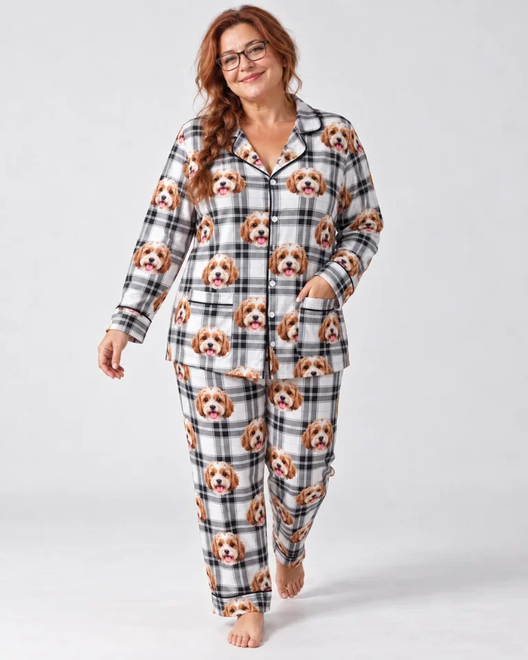 Woman wearing red pajamas covered in doodle puppy faces on white plaid fabric with contrast piping — MyDogPics
