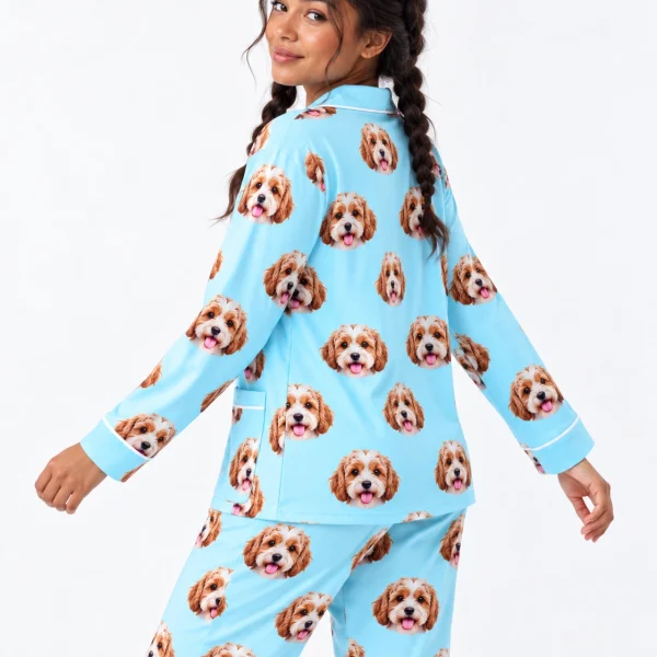 Woman posing in red pajamas, doodle puppy faces on light blue fabric with contrast piping — MyDogPics