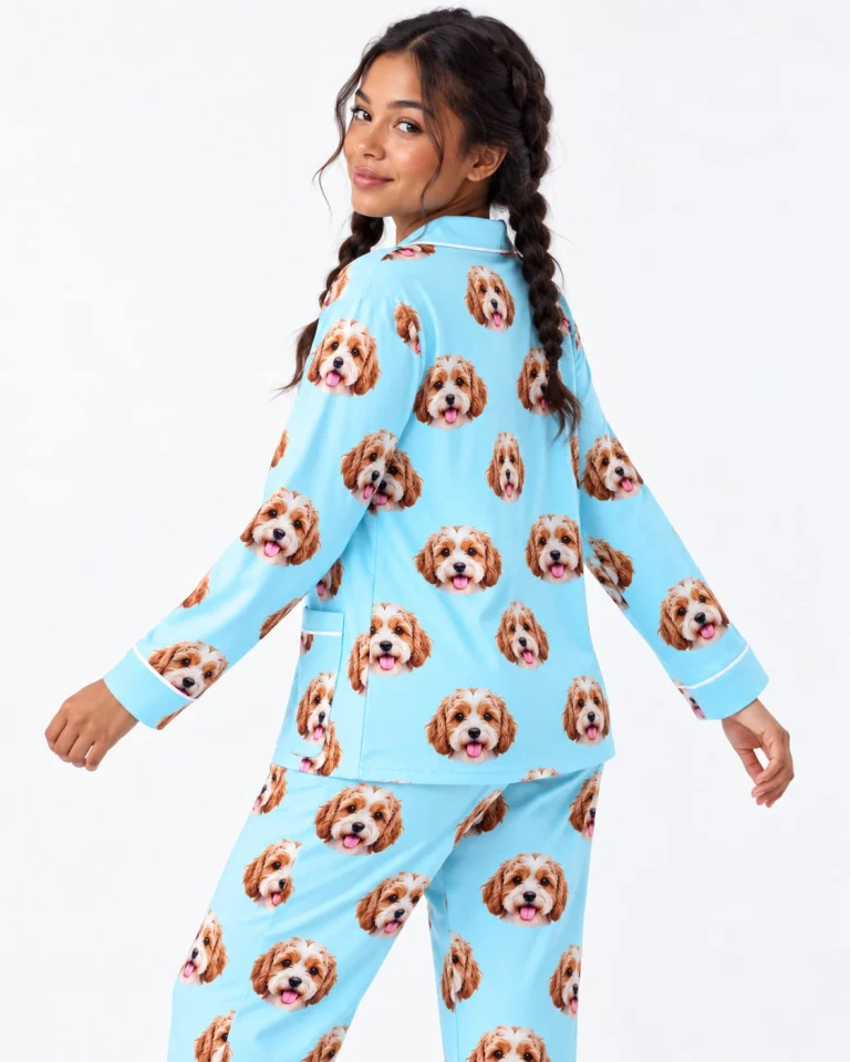 Woman posing in red pajamas, doodle puppy faces on light blue fabric with contrast piping — MyDogPics