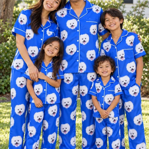 Man and his family in matching red satin pajamas with white Pomeranian faces on royal blue satin — MyDogPics
