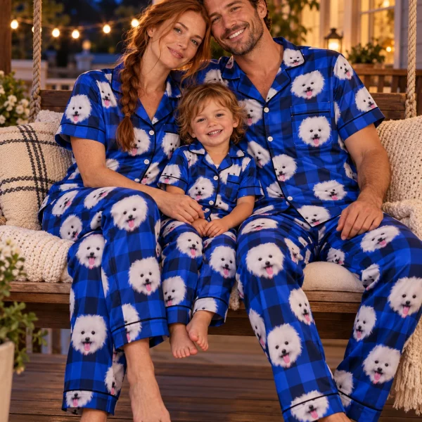 Woman and her family in matching satin pajamas for men with white Pomeranian faces on blue plaid satin — MyDogPics