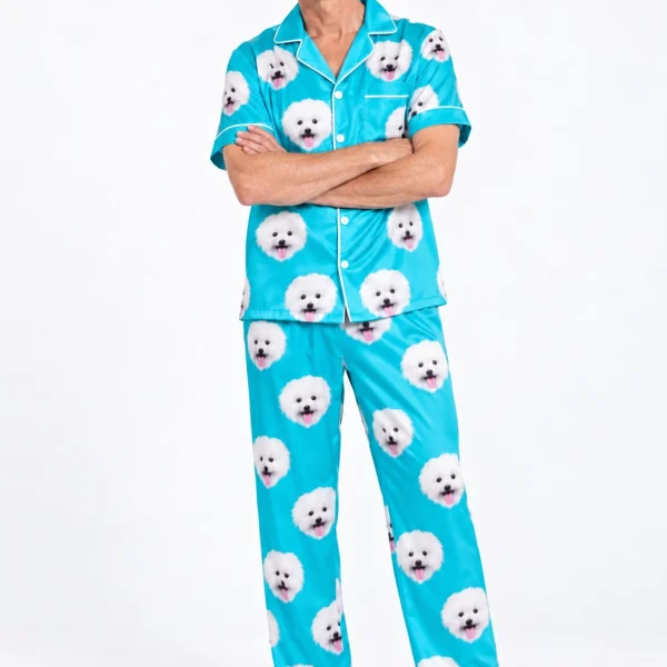 Man wearing a satin pajamas for men covered in white Pomeranian faces on teal satin — MyDogPics