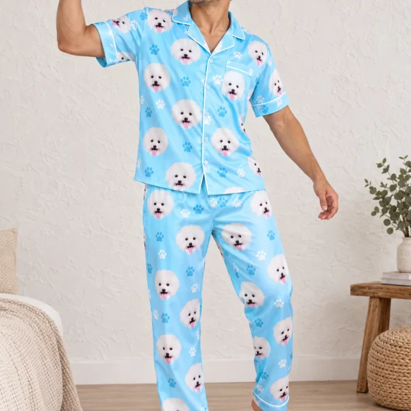 Man posing in a satin pajamas for men, white Pomeranian faces on light blue paw-print satin — MyDogPics
