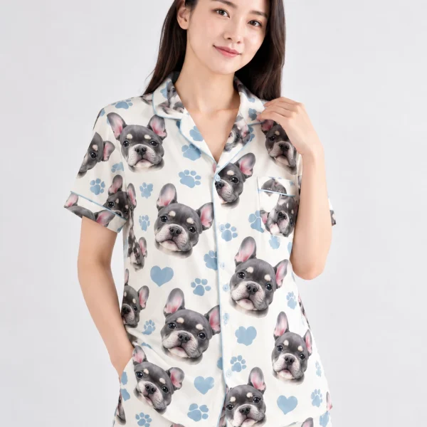 Close-up of the satin short pajama set print: grey French bulldog faces on cream satin with blue hearts — MyDogPics