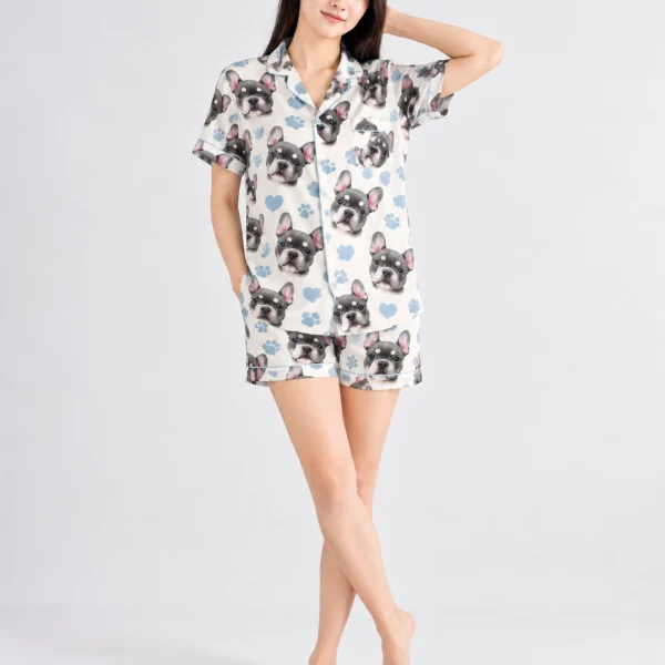 Woman posing in a satin short pajama set, grey French bulldog faces on cream satin with blue hearts — MyDogPics