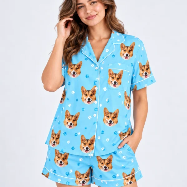 Close-up of the short sleeve satin pajama set print: corgi faces on sky blue satin with white piping — MyDogPics