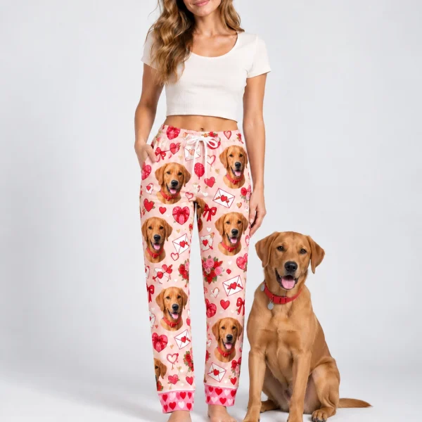 Woman in Valentine pajama pants standing next to her golden retriever — MyDogPics