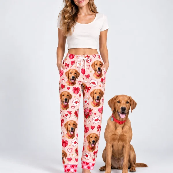 Woman in Valentine pajama pants standing next to her golden retriever — MyDogPics