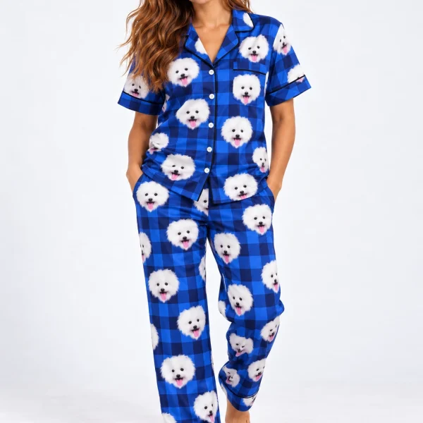 Woman wearing Valentines day pajamas covered in white Pomeranian faces on blue plaid satin — MyDogPics