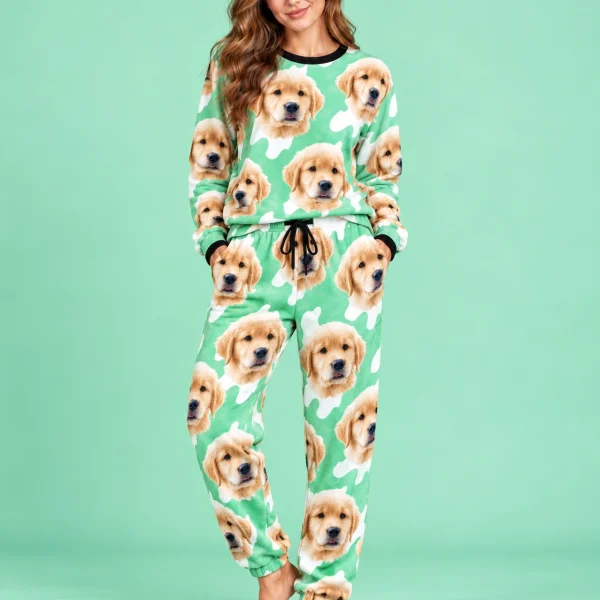 Woman posing in warm pajamas, golden retriever puppy faces on a mint green and white spot print — MyDogPics