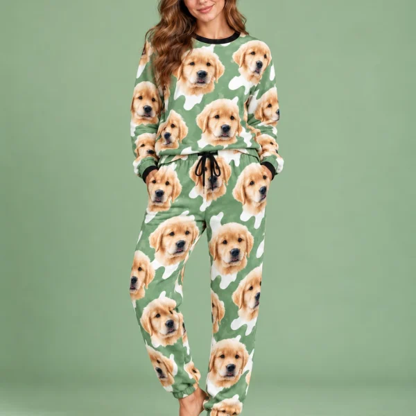 Woman posing in warm pajamas, golden retriever puppy faces on a sage green and white spot print — MyDogPics