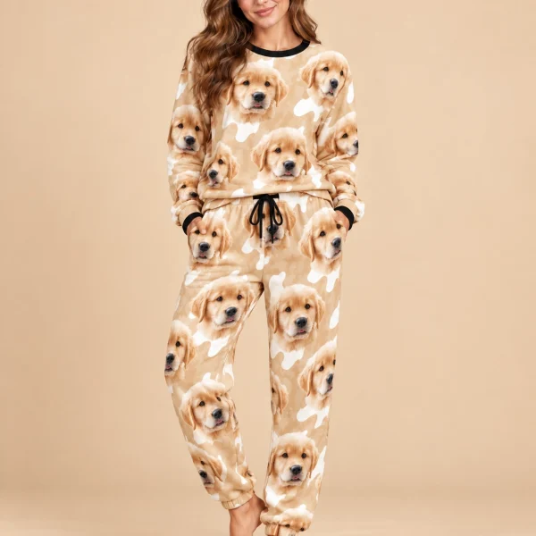 Woman posing in warm pajamas, golden retriever puppy faces on a tan and white spot print — MyDogPics
