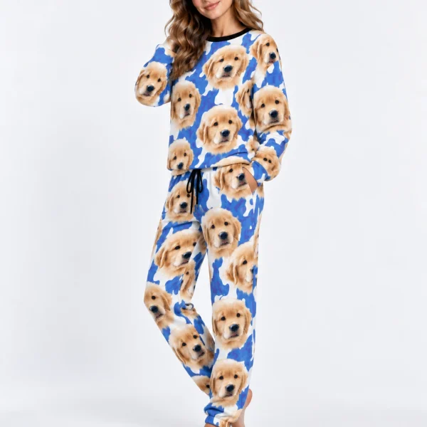 Side view of warm pajamas with golden retriever puppy faces on a blue and white spot print — MyDogPics