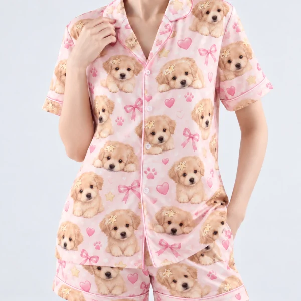 Close-up of the womens dog pajamas print: fluffy cream puppy faces on blush pink satin with bows — MyDogPics
