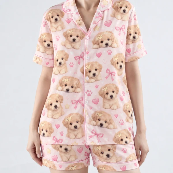 Close-up of the womens dog pajamas print: fluffy cream puppy faces on blush pink satin with bows — MyDogPics