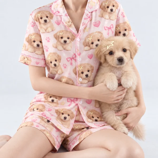 Woman in womens dog pajamas cuddling her fluffy puppy — MyDogPics