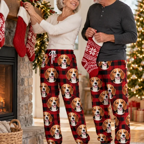Woman and her partner in matching beagle Christmas pajama pants with tricolor Beagle (black, tan and white) faces — MyDogPics