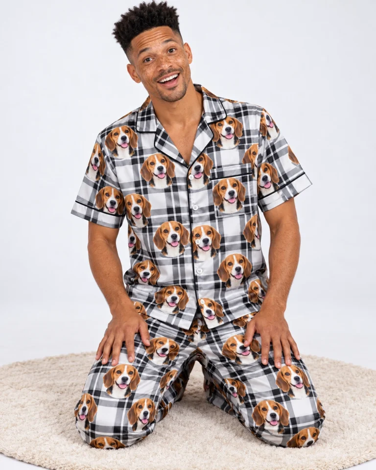 Man sitting in beagle dad pajamas covered in tricolor Beagle (black, tan and white) faces — MyDogPics