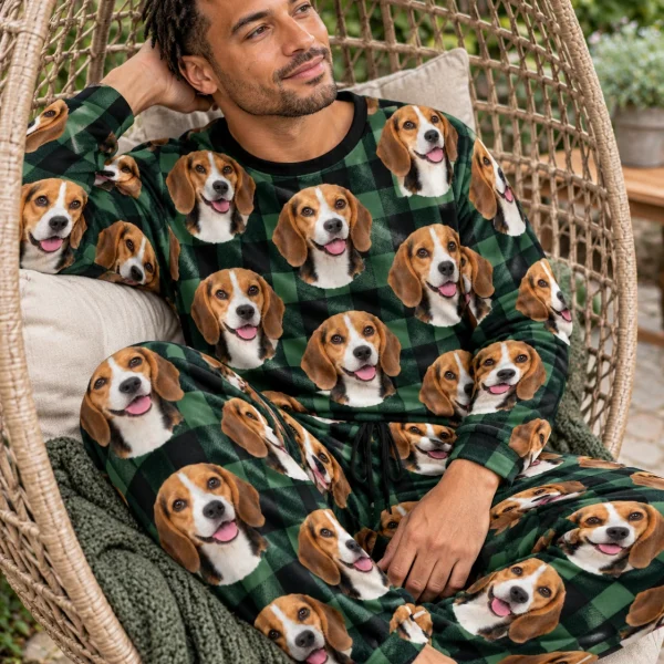 Man sitting in a beagle pajama set covered in tricolor Beagle (black, tan and white) faces — MyDogPics