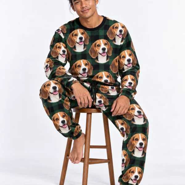 Man sitting in a beagle pajama set covered in tricolor Beagle (black, tan and white) faces — MyDogPics