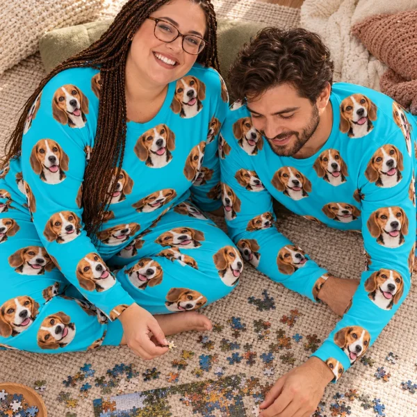Woman and her partner in matching beagle pajamas for adults with tricolor Beagle (black, tan and white) faces — MyDogPics