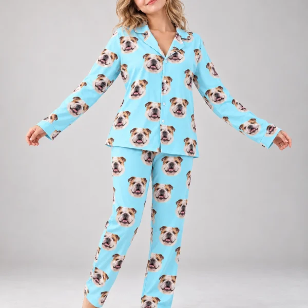 Woman posing in british bulldog pajamas, white-and-fawn English Bulldog faces on light blue fabric — MyDogPics