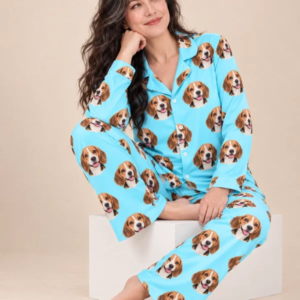 Woman sitting in custom beagle pajamas covered in tricolor Beagle (black, tan and white) faces — MyDogPics