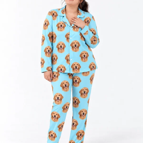 Woman wearing custom golden retriever pajamas covered in golden Golden Retriever faces on light blue fabric — MyDogPics