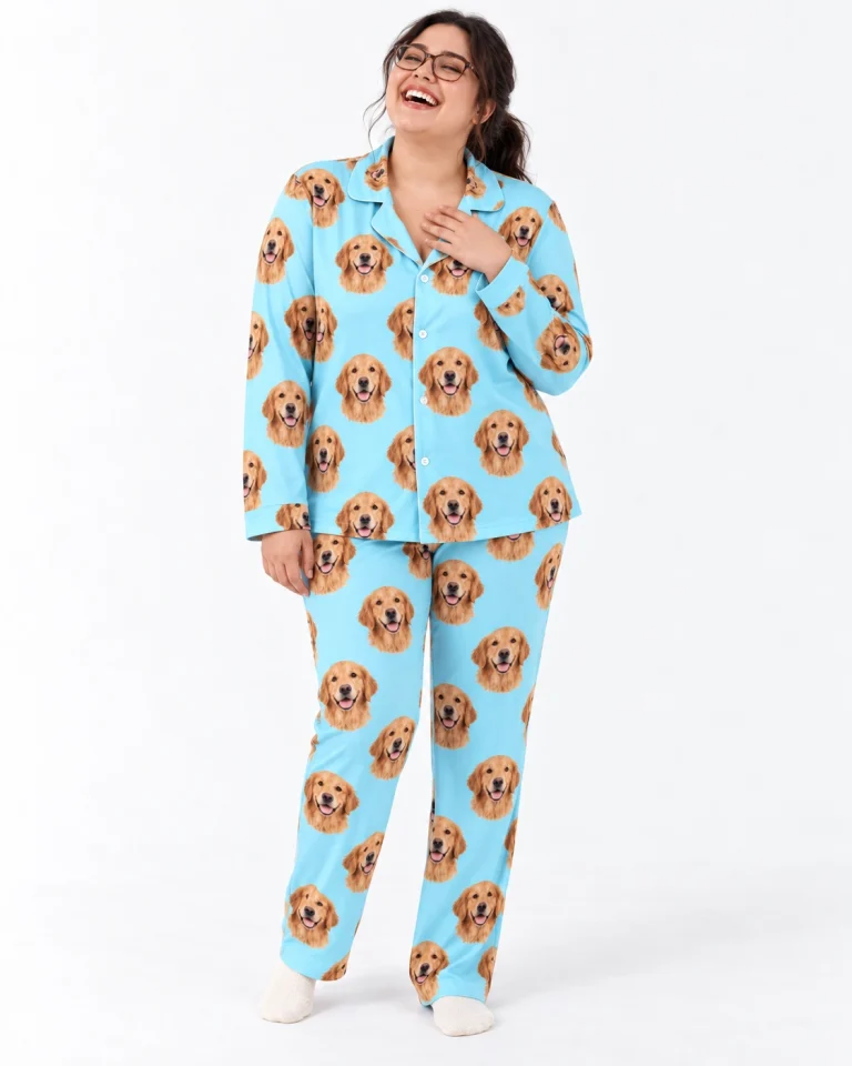 Woman wearing custom golden retriever pajamas covered in golden Golden Retriever faces on light blue fabric — MyDogPics