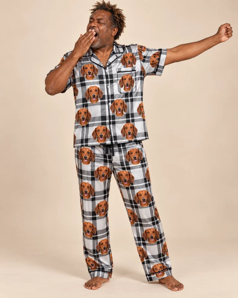 Man posing in dachshund dad pajamas, red smooth-coated Dachshund faces on white plaid satin — MyDogPics