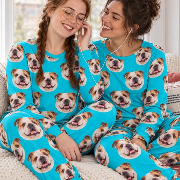 Woman and her friend in matching english bulldog pajamas for adults with white-and-fawn English Bulldog faces — MyDogPics