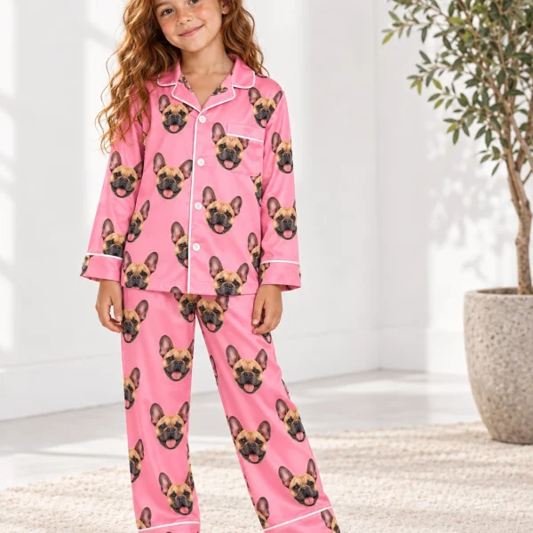 Girl wearing girls French bulldog pajamas covered in fawn French Bulldog faces on pink satin — MyDogPics
