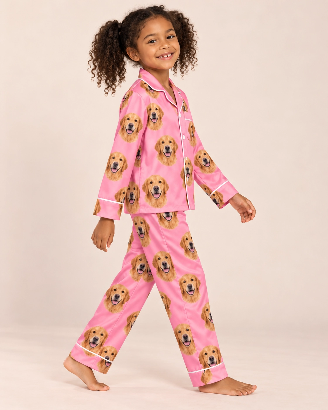 Girls Golden Retriever Pajamas – Pose, Pink | MyDogPics Girl posing in girls golden retriever pajamas, golden Golden Retriever faces on pink satin — MyDogPics