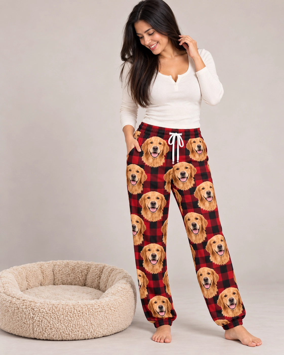 Golden Retriever Christmas Pajama Pants – Front View, Red Plaid | MyDogPics Woman wearing golden retriever Christmas pajama pants covered in golden Golden Retriever faces — MyDogPics
