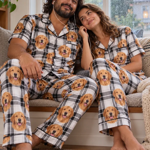 Man and his partner in matching golden retriever dad pajamas with golden Golden Retriever faces — MyDogPics