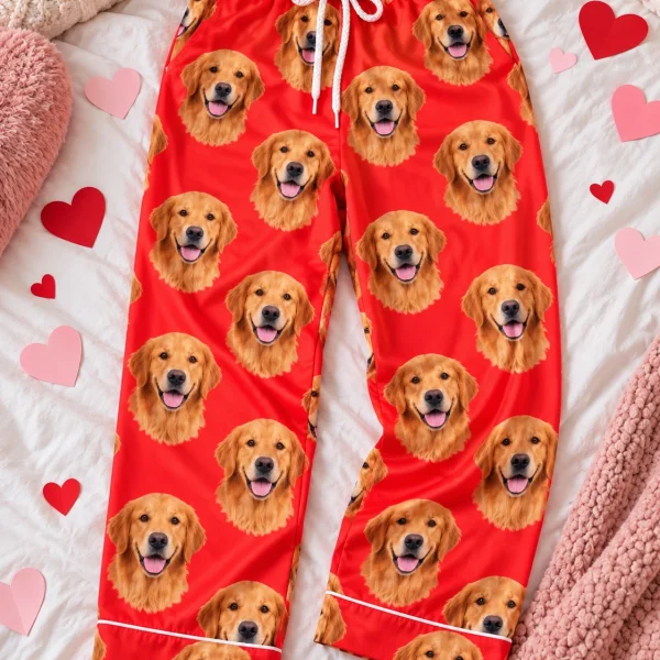 Flat lay of golden retriever Valentine pajamas: pants covered in golden Golden Retriever faces — MyDogPics