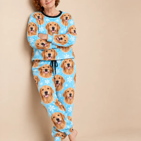 Woman wearing golden retriever winter pajamas covered in golden Golden Retriever faces — MyDogPics
