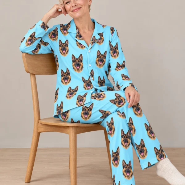 Woman wearing gsd pajamas covered in black-and-tan German Shepherd faces on light blue fabric — MyDogPics