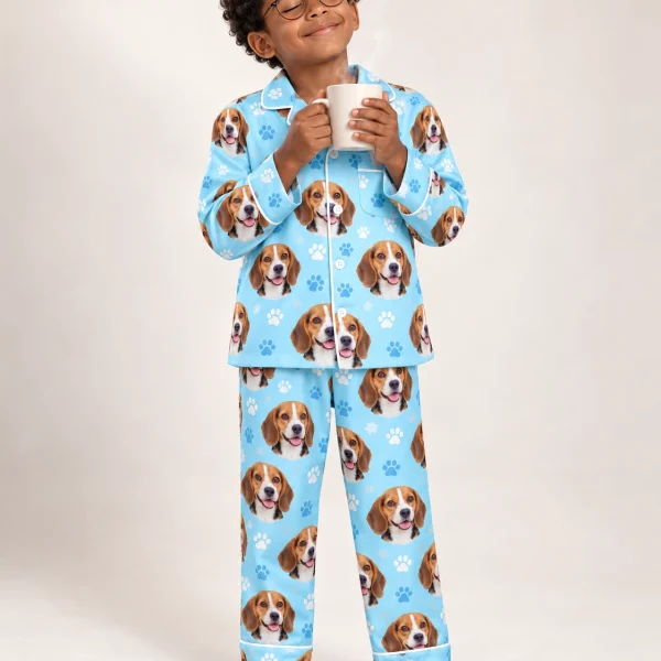 Boy wearing kids beagle pajamas covered in tricolor Beagle (black, tan and white) faces — MyDogPics