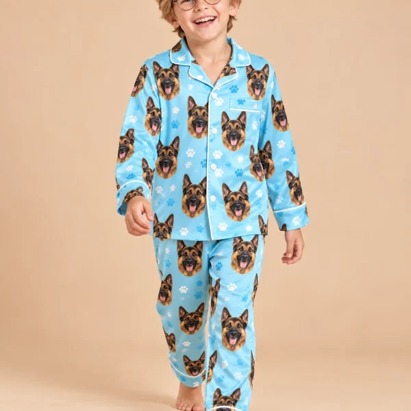 Boy wearing kids German shepherd pajamas covered in black-and-tan German Shepherd faces — MyDogPics
