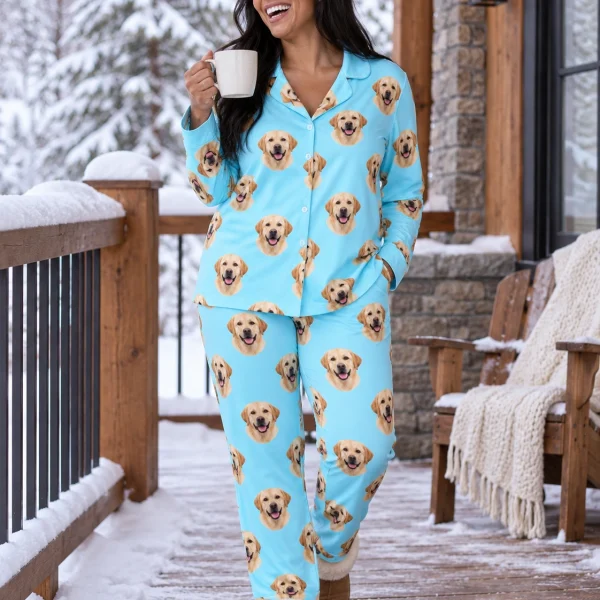 Woman posing in lab pajamas, yellow Labrador Retriever faces on light blue fabric — MyDogPics
