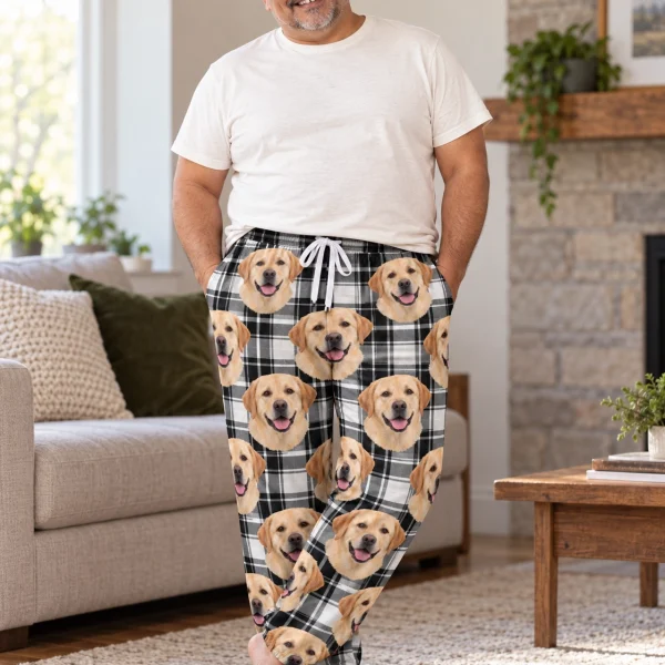 Man posing in labrador pajama pants, yellow Labrador Retriever faces on white plaid fabric — MyDogPics