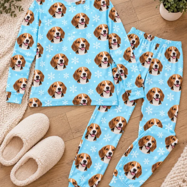 Flat lay of matching beagle pajamas: top and pants covered in tricolor Beagle (black, tan and white) faces — MyDogPics